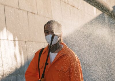 Soft wash / low-pressure spray application on exterior surfaces